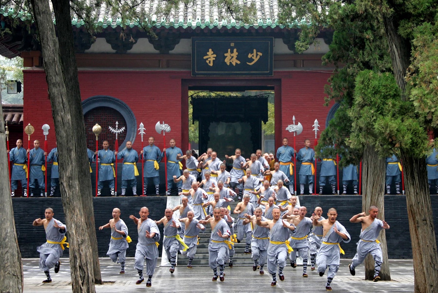 Shaolin monks in front of Shaolin Temple in Henan